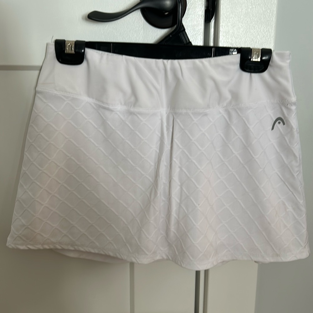 HEAD women’s tennis/pickleball skirt with built in spandex shorts.